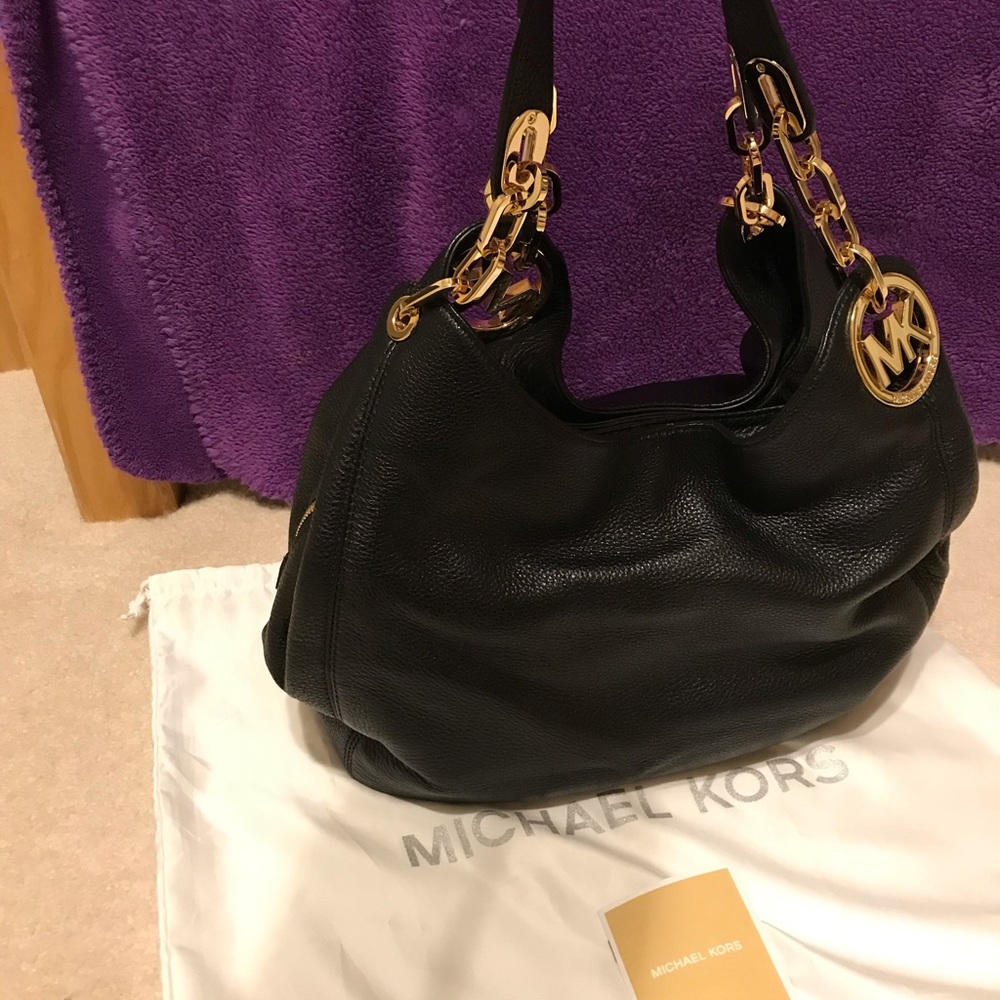 Michael Kors handbag .Classic Black with gold trim